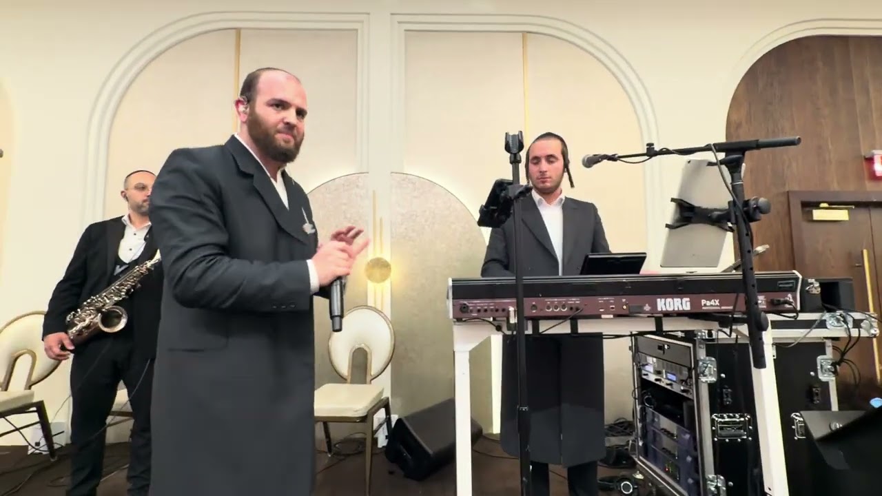Nuchem Weinberger on the keys & Chaim Brawn @ Motty Konig