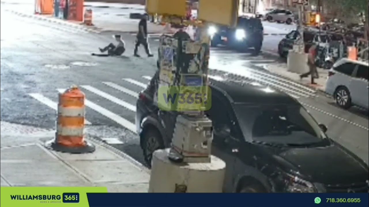 Seven individuals emerging from a manhole on Bedford Avenue