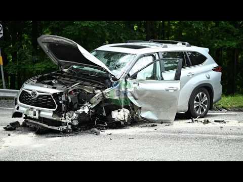 Pickup truck trying to pass traffic crashed head-on into an oncoming car before veering into woods.
