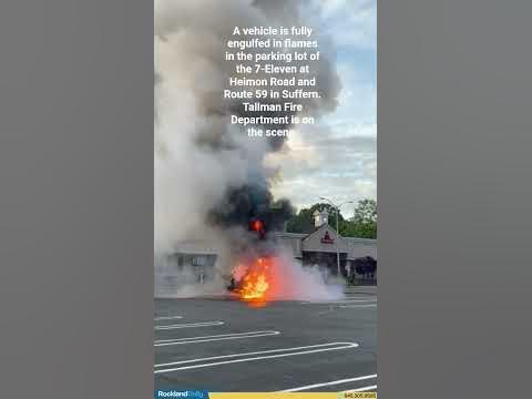 Vehicle is fully engulfed in flames in the parking lot of the 7-Eleven