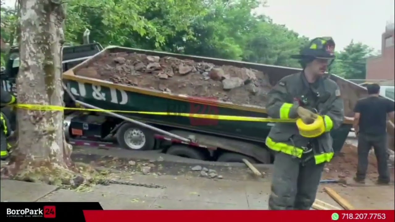 Sinkhole Opens Beneath Dumpster Truck on 51st Street