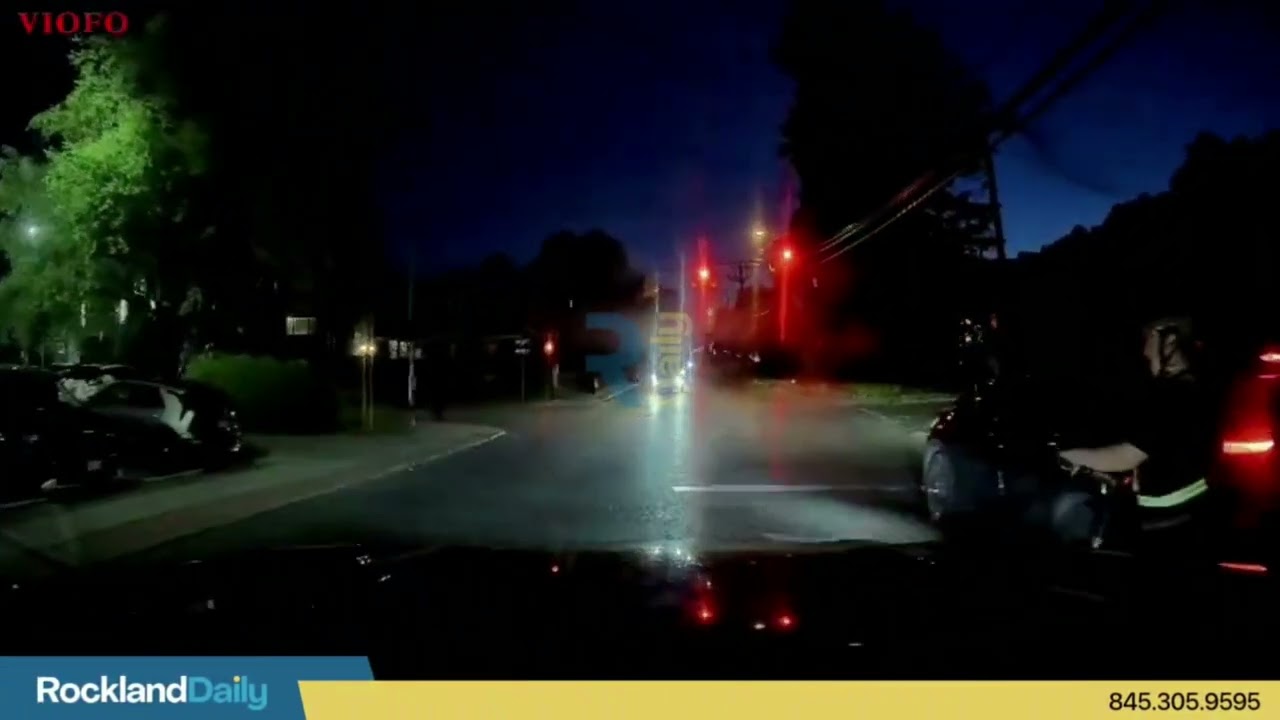 Electric scooter rider swerves into traffic on Maple Ave, nearly causing a serious collision.