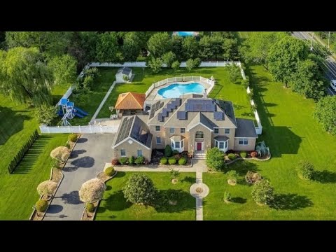 For sale! Stunning 7-Bedroom Home in a Prime Toms River Location with a Gorgeous Backyard & Pool.