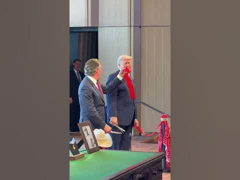 President Trump cuts the ribbon to officially open the Theodore Roosevelt Library in North Dakota