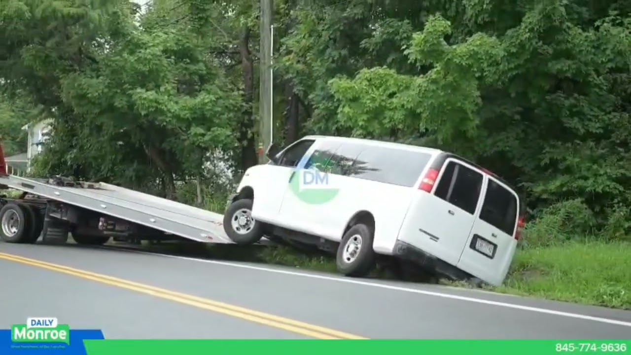 ICE vehicle became stuck in a ditch on Ridge Road. Fellow ICE agents responded to assist.