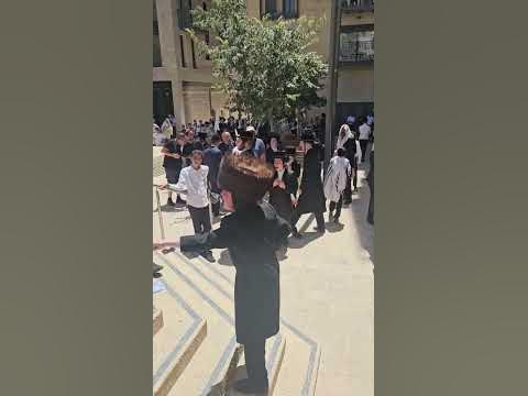 Ultra-Orthodox protest in Jerusalem outside the 'HaSimta' cafe, which is open on Shabbat.