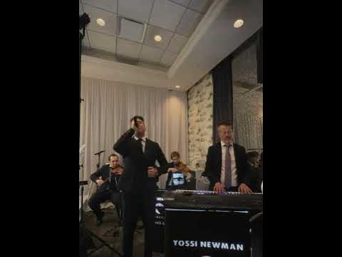 Dovid Rotberg with Yossi Newman