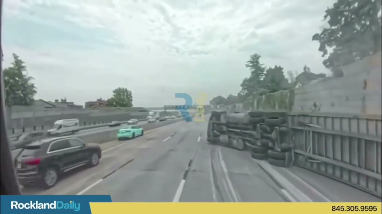 Tractor-trailer rolled over on the I-87 southbound, after striking an overpass that was too low