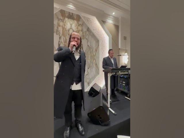 Yerichem Weiss with Sruli Singer