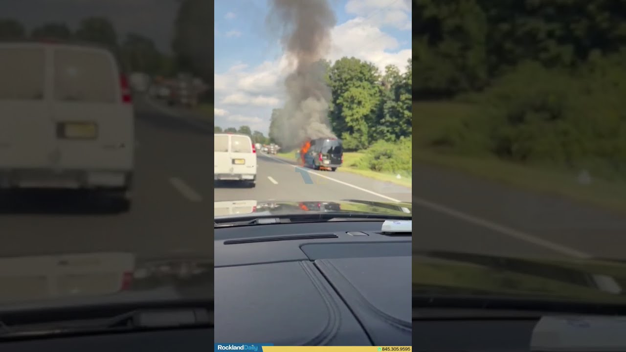 A vehicle engulfed on the New York State Thruway southbound, approximately two miles before Exit 14B