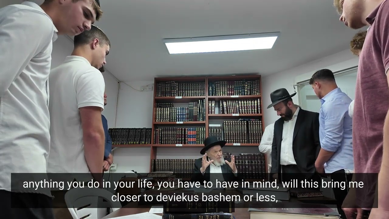 A lovely moment: Rabbi Moshe Hillel Hirsch converses with boys from about their purpose in the world