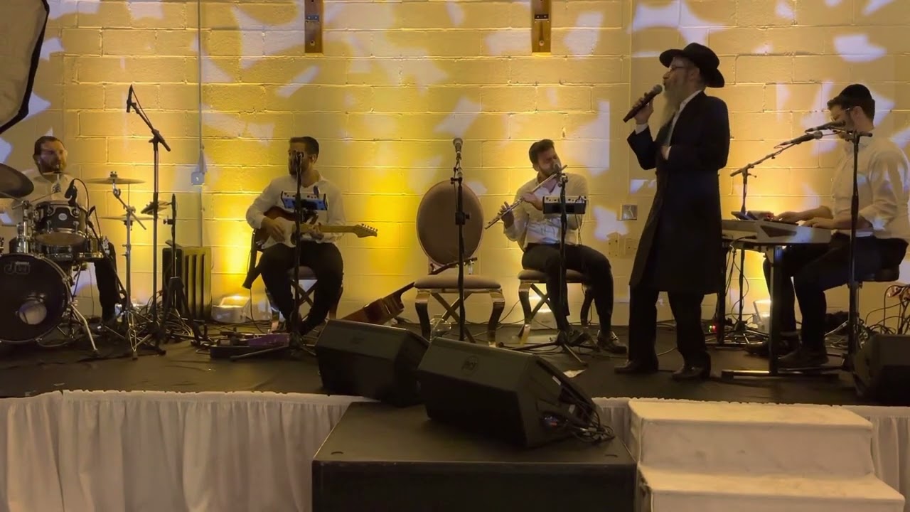 Avraham Fried performing Keep Climbing with Mendy Panski