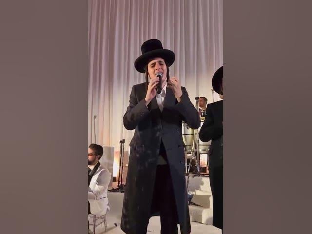 Zanvil Weinberger, Motty Steinmetz and Hershy Weinberger with Freilach Band