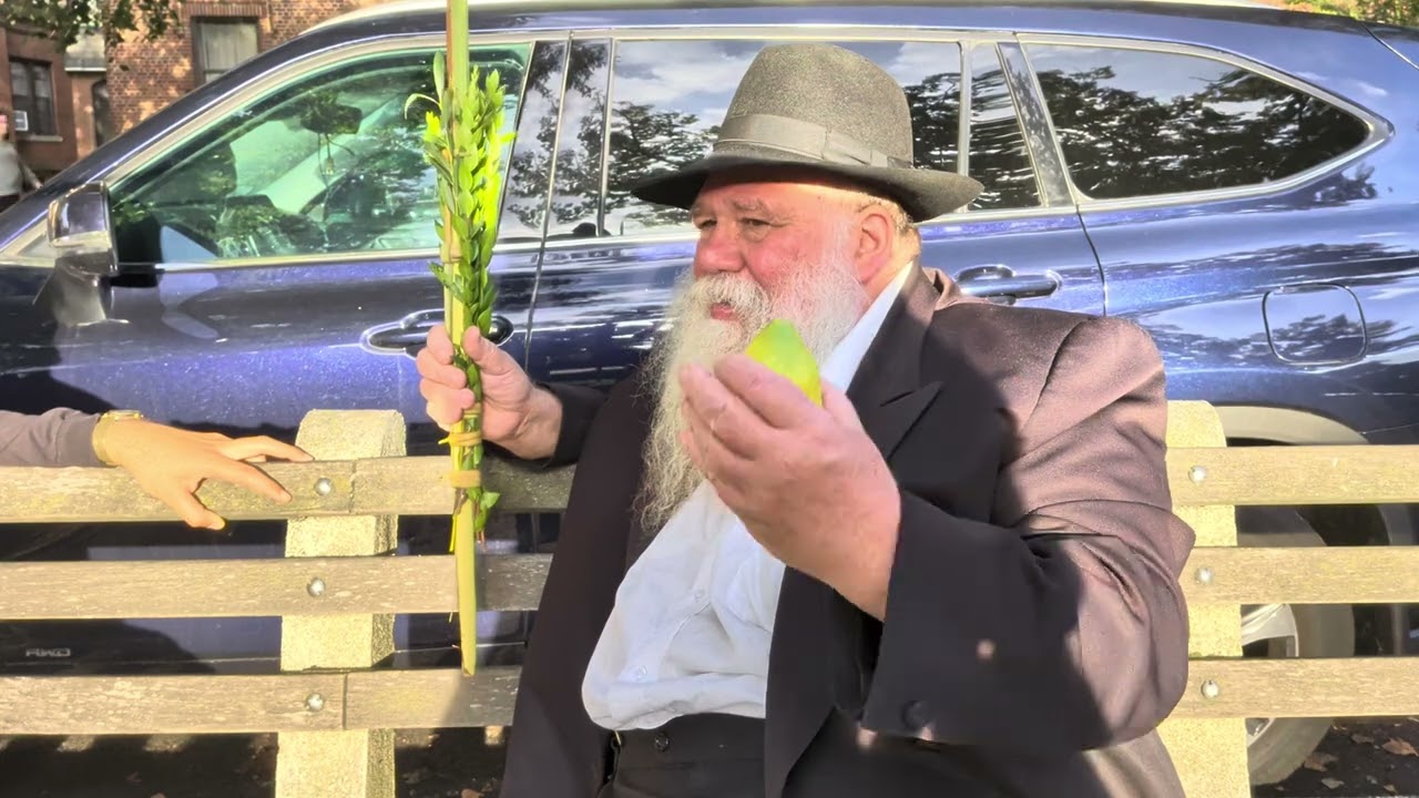 #18 Rabbi Dalfin in Brooklyn, Ocean Pkwy & 18 Ave, greeting people with Lulav & Esrog on Sukkos