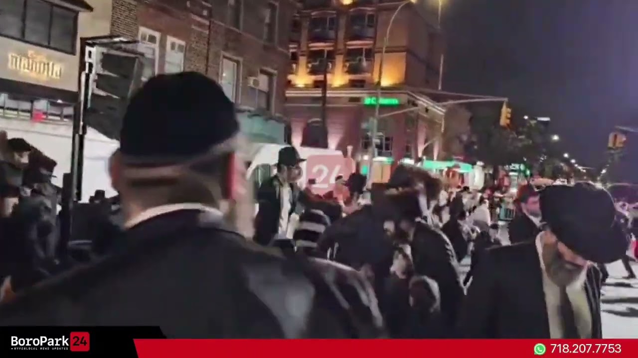 Joyous music and dancing at the Simchas Beis Hashoieva on 13th Avenue and 48th Street.