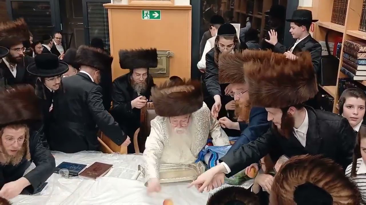 Zmigrad Antwerp Rebbe Giving Out Apples Motzoei Simchas Torah 5787