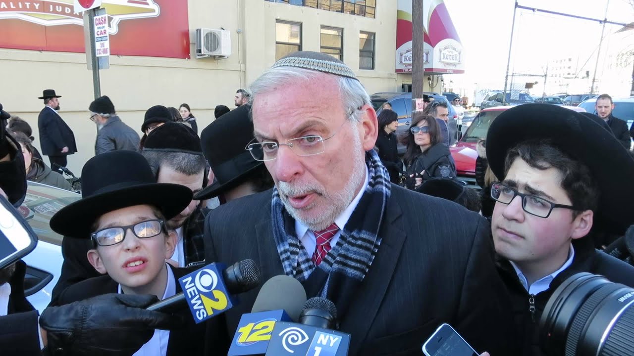 Assemblyman Dov Hikind speaking after funeral of 7 children killed in fire