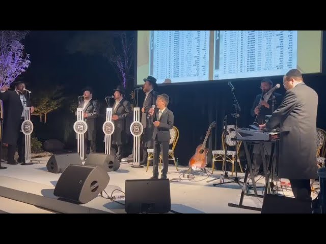 Child Soloist Meir Rosinger Entertaining At Event With The Shira Choir