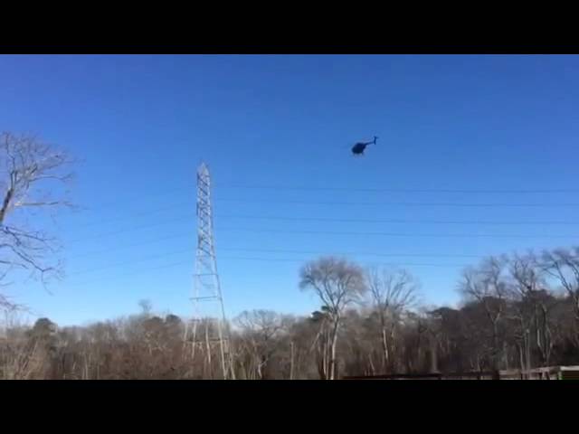 Helicopter Inspecting JCPL wires