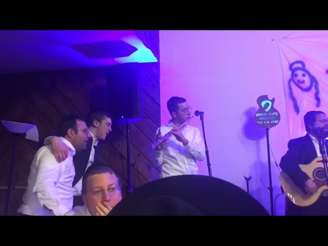 Moshe Katz at a Kumzitz in Camp Kerister