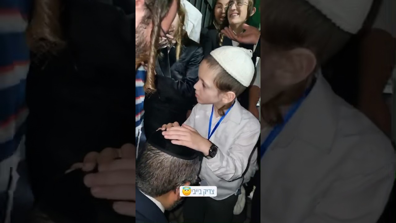 Young Rebbe Blessing People In Uman