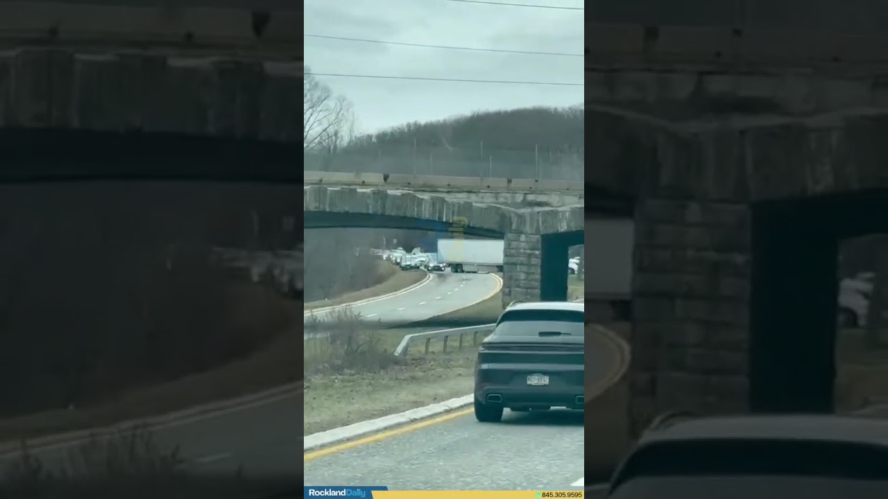 Truck entered the Palisades Parkway and made a U-turn to avoid an overpass accident causing traffic.