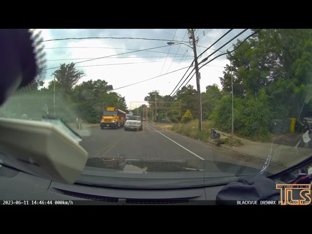 Driver goes around school bus dropping off student