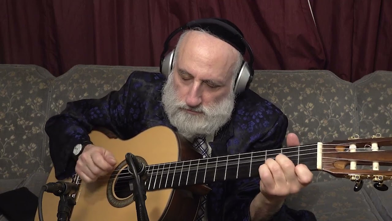 "Davenen"  composed by  Hershy Weinberger. Arranged for fingerstyle guitar by Yaakov Kranz.