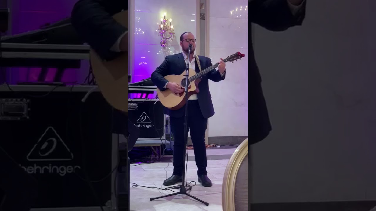 Moshe Groner singing Abie Rotenberg's "Yihai zeh" at a chupa.