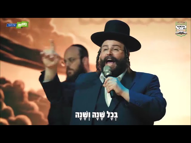 אהרן זאב ברנשטיין בציור אומנותי בחול לכבוד רבי חיים קנייבסקי זצוק"ל