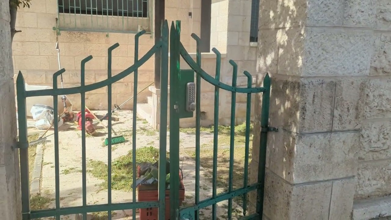 Katamon #6- Original gates at entrance to Belzer Rebbe's apartment - Rabbi Chaim Dalfin