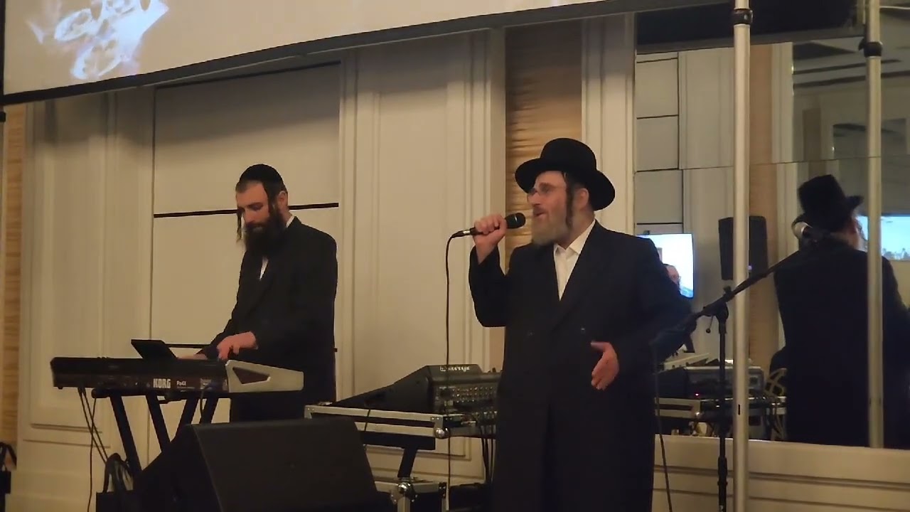Isaac Honig Singing Harachaman at the Hilchasa event in Lakewood