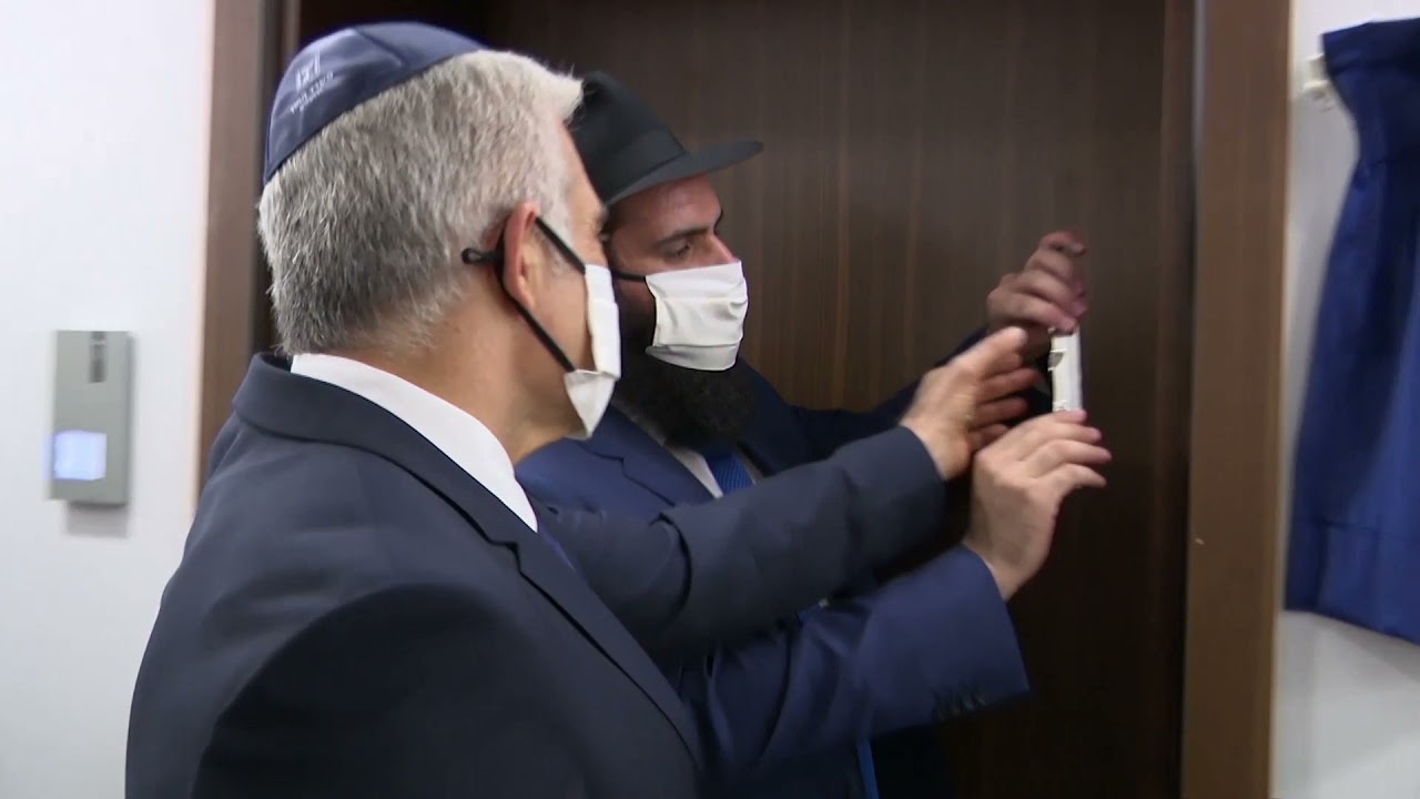 Yair Lapid Affixing Mezuza at Israeli Embassy UAE