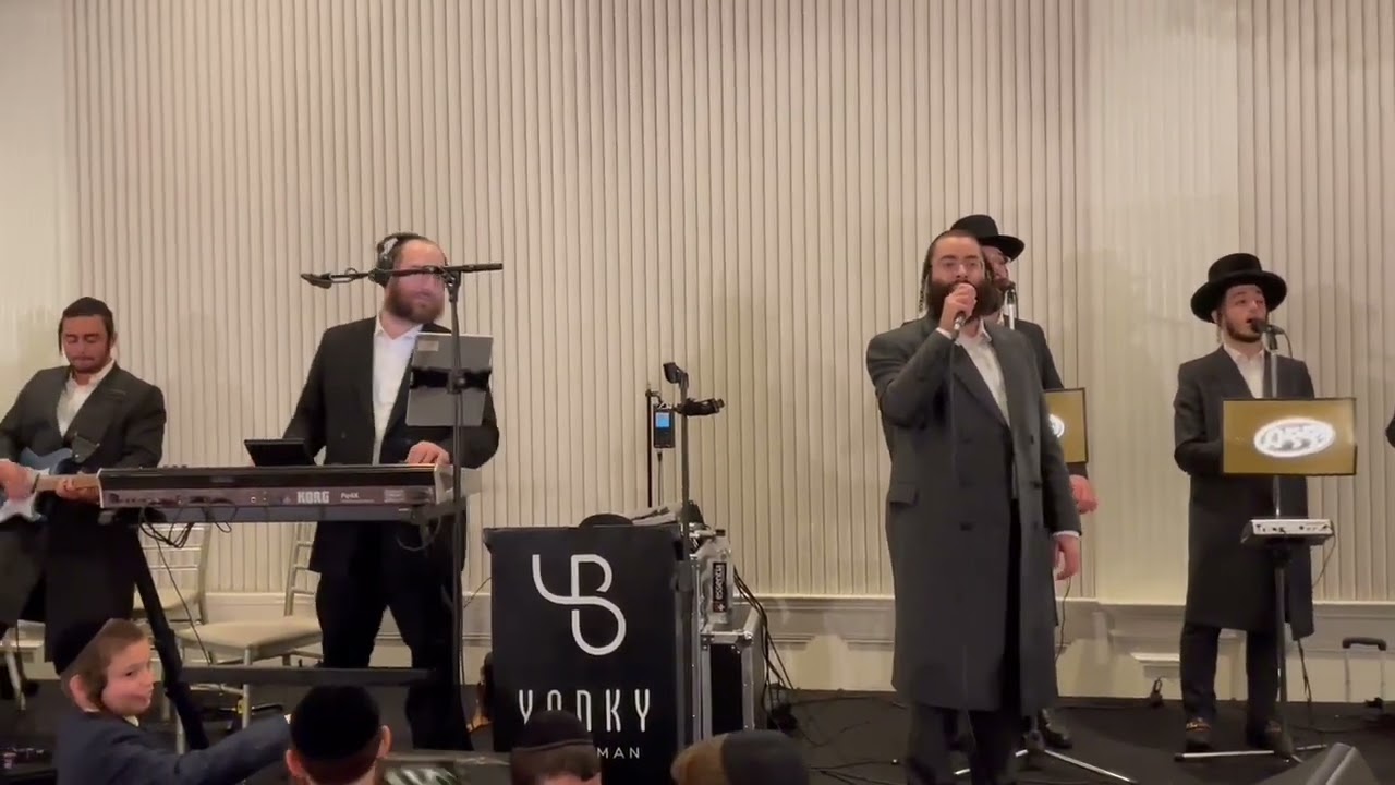 שמעיה פישר עם מקהלת ידידים ותזמורת של יענקי בריסקמן