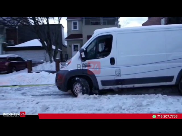 Vehicle Stuck in The Snow on East 3rd Street and Elmwood Avenue.