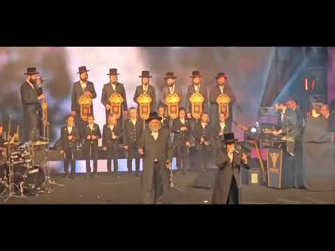 מוטי שטיינמץ עם דודי קאליש מקהלת מלכות בדינר מוסדות איחוד גור
