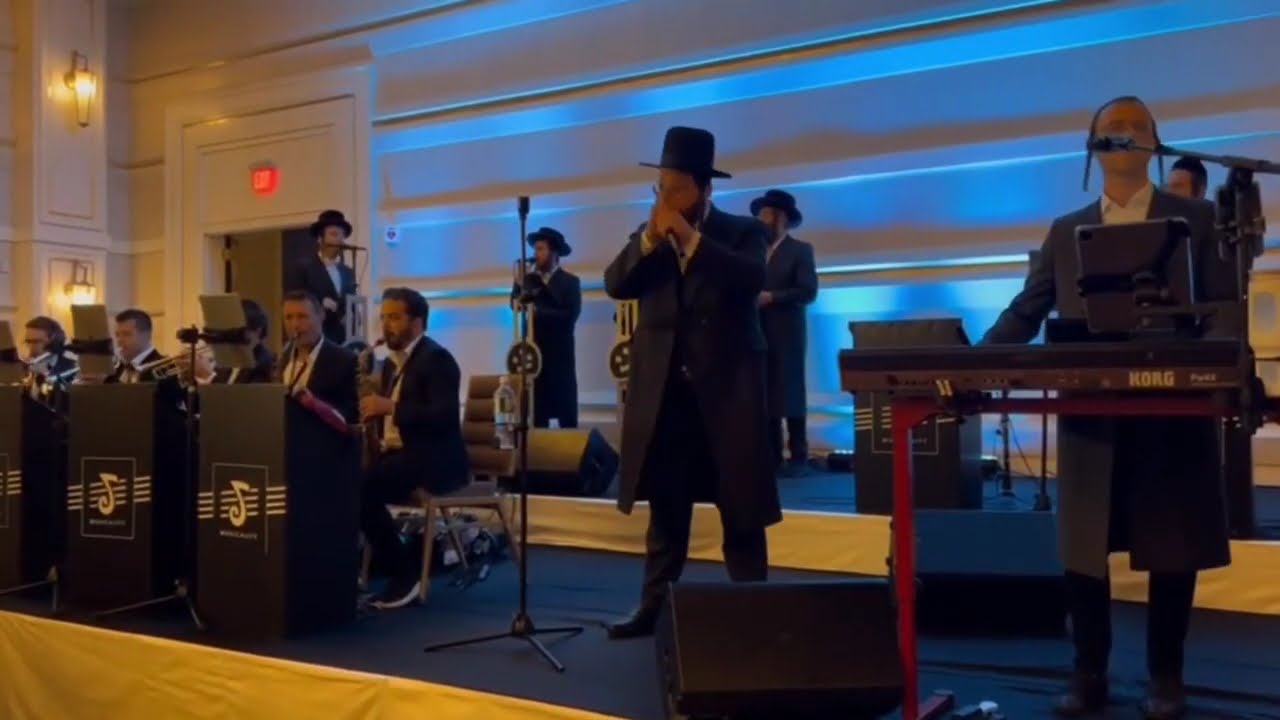 שרולי אלטמן עם מקהלת שירה ותזמורת של יוסי שטענדיג