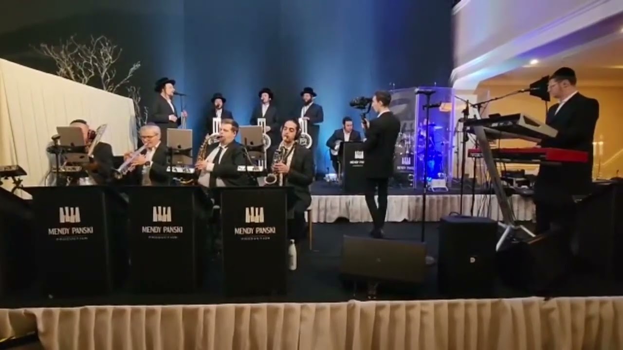 שמעיה פישר עם מקהלת שירה ותזמורת של מנדי פנסקי