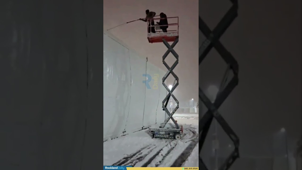 Evergreen was seen clearing snow from their seasonal tent.