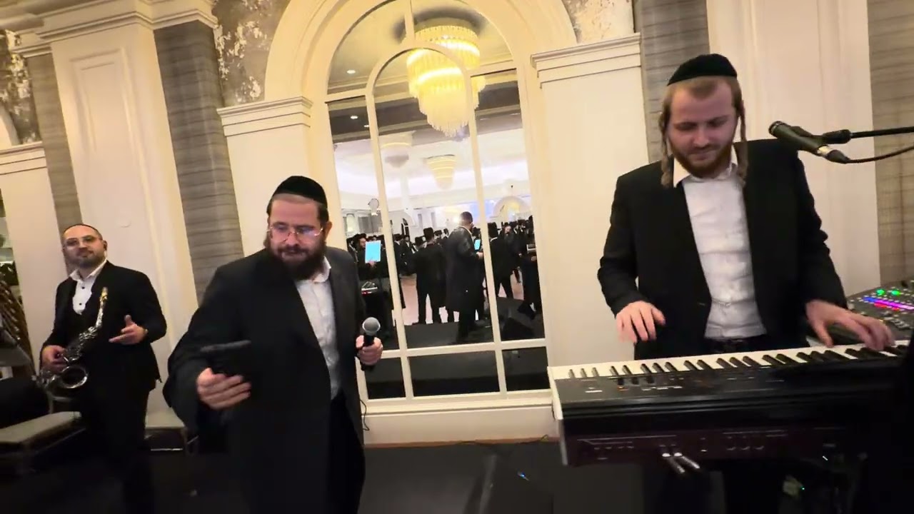 Hershey Langsam on the keys & Shea Berko @ Chaim Reuven Weill & Lefkowitz