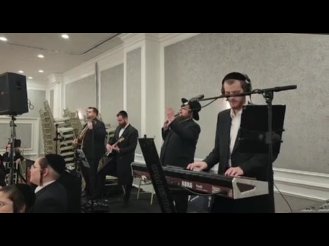יששכר גוטמן עם הערשי לאנגסם