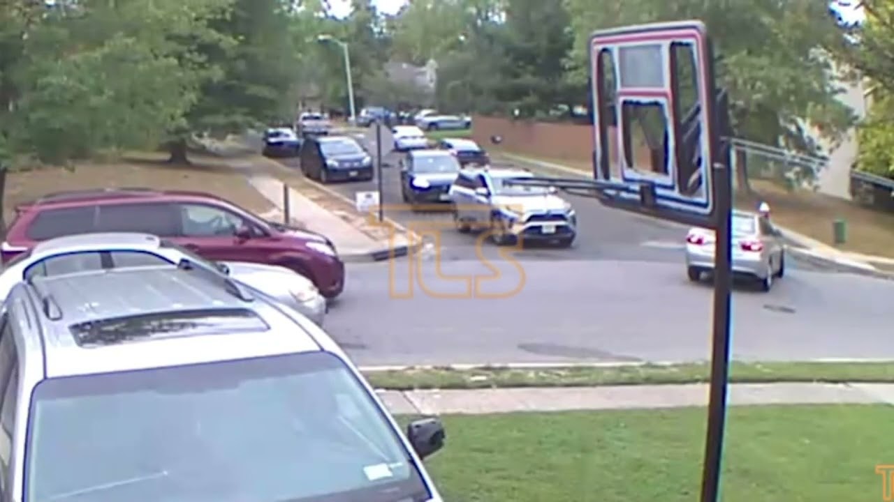 Scooterist struck by vehicle after riding into traffic - surveillance video