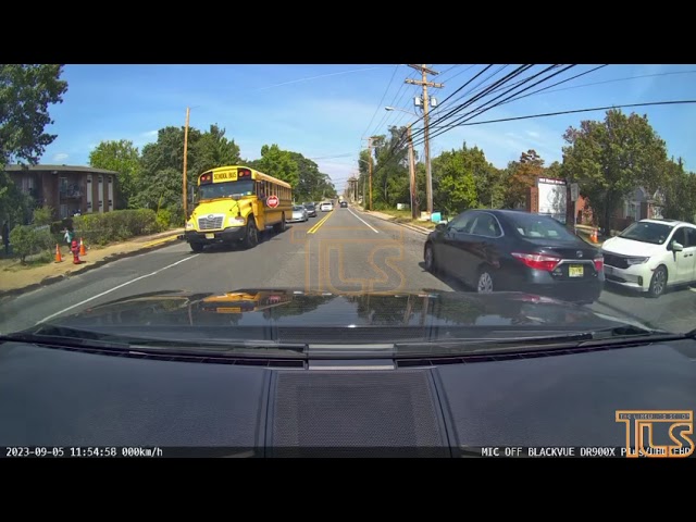 Car goes on shoulder to pass bus lights on Rt. 9