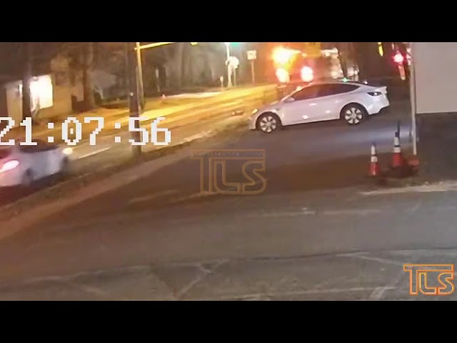 Car passing school bus
