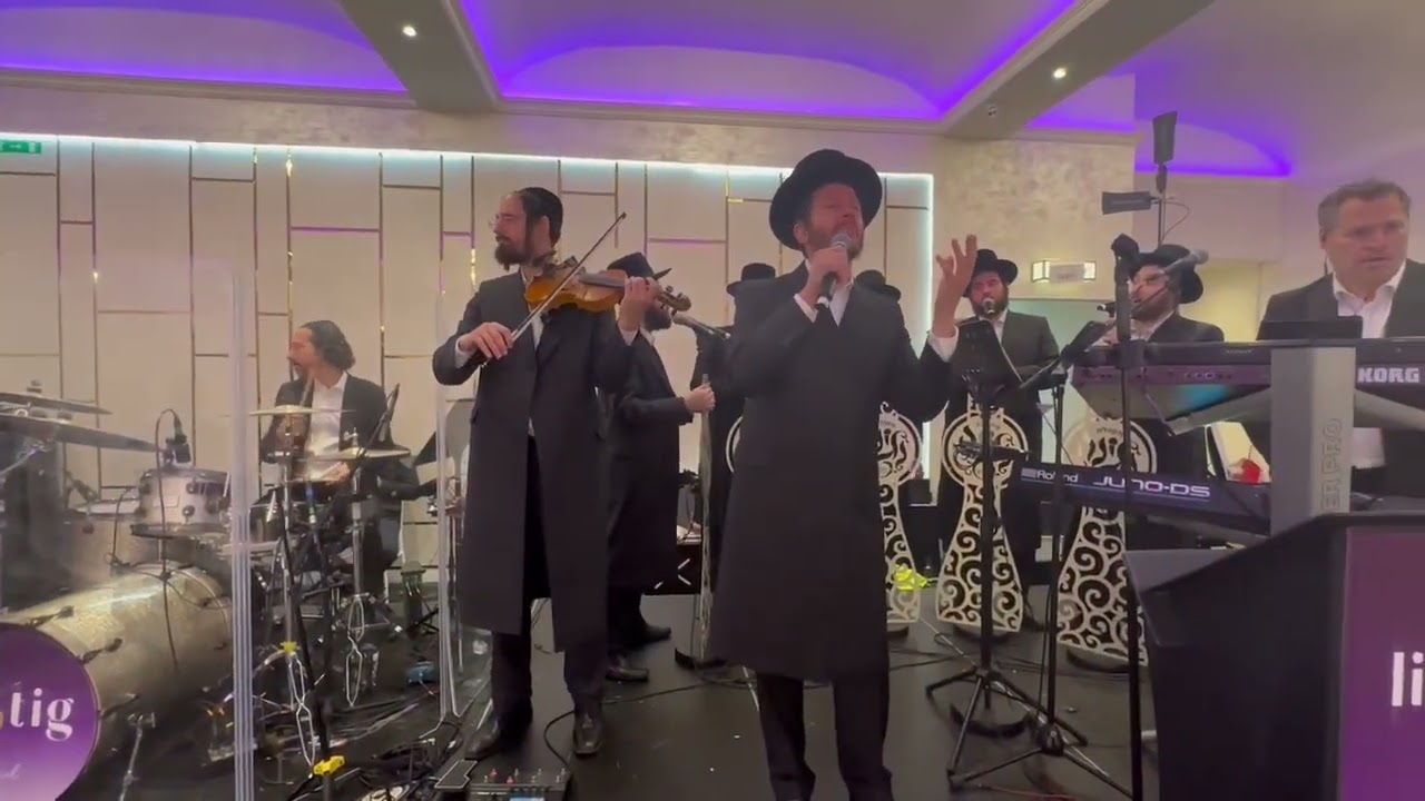 שלומי גרטנר עם מקהלת נגינה וListig band