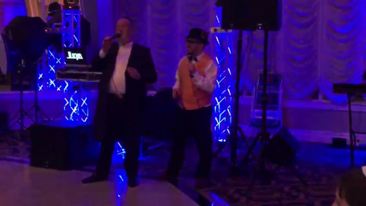 Michoel Schnitzler & lipa schmeltzer singing together at the bar mitzvah of lipa's son!