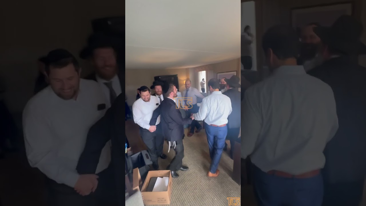 Rabbi Eisemann dancing after case is dismissed
