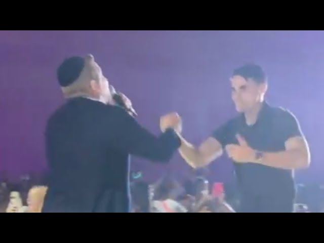 Ben Shapiro Dancing With Mordechai Shapiro At A Concert
