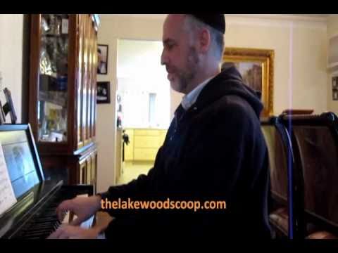 Yisroel Meir Shapiro of Acheinu playing his own Kashoshana on piano from latest album.wmv