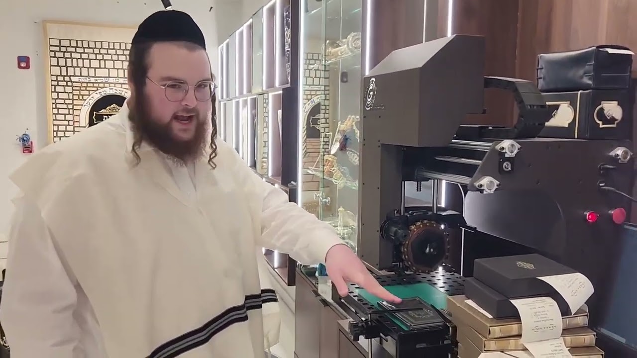 Avrumi Steinberg visits 'Malchus judaica'  to view their beautiful Chanukah collection